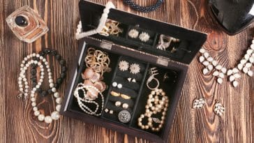 jewelry accessories in box and table, top view