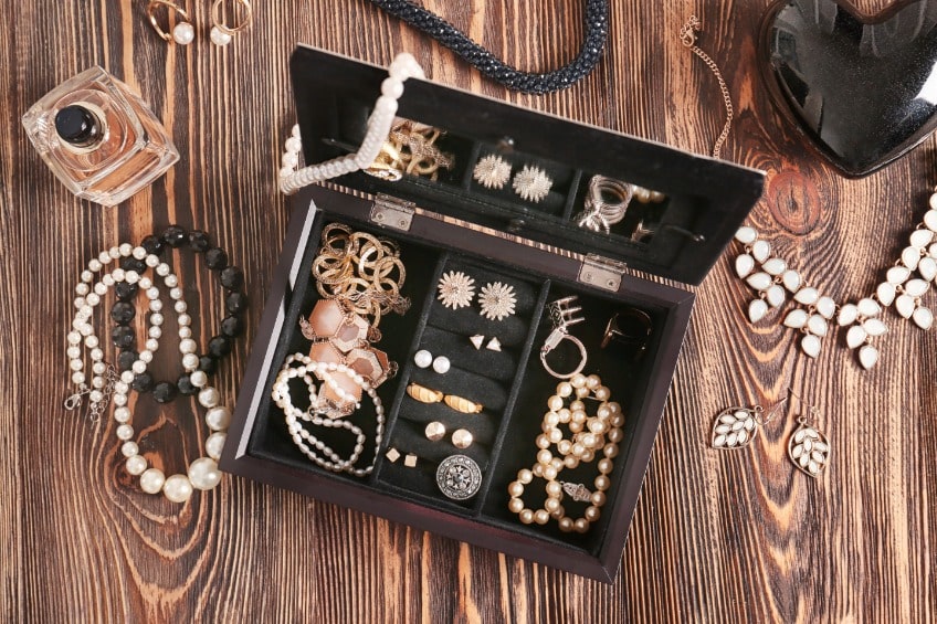 jewelry accessories in box and table, top view
