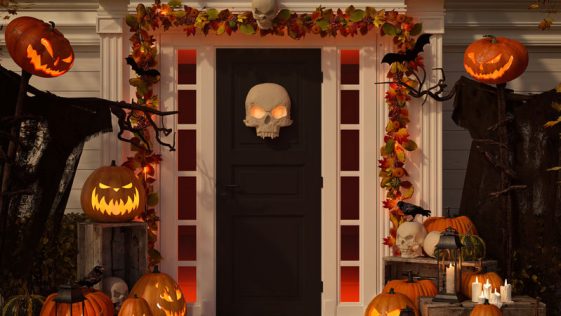 halloween decorated house with pumpkins and skulls. 3d rendering