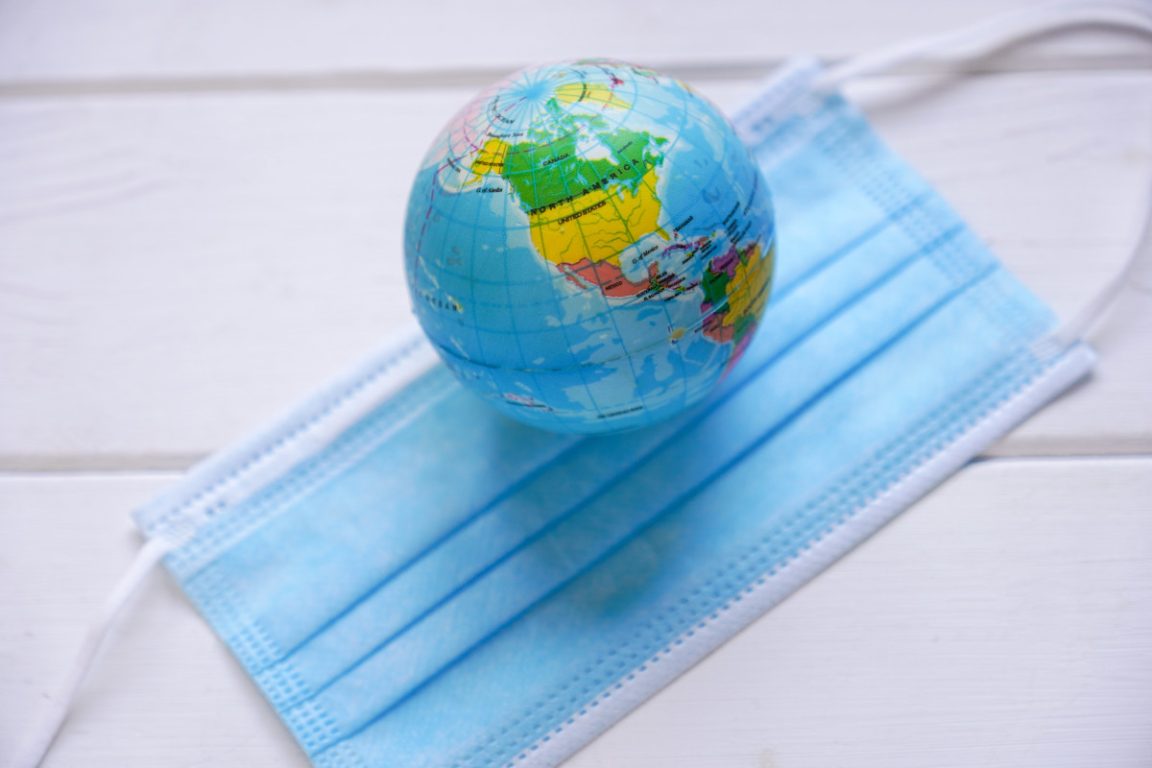 globe and medical face mask global pandemic co 2023 11 27 05 31 26 utc