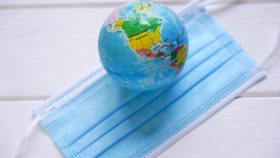 globe and medical face mask global pandemic co 2023 11 27 05 31 26 utc