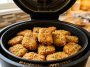 découvrez les temps et températures idéaux pour cuire vos nuggets à la friteuse à air, qu'ils soient surgelés, faits maison ou copycat mcdo, pour un résultat croustillant et savoureux.